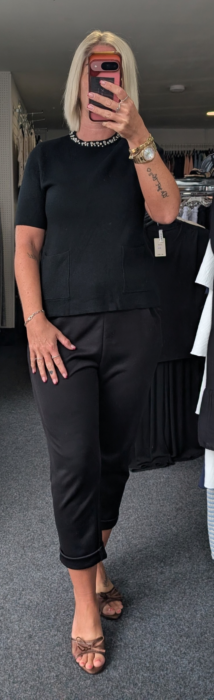Knit Top With Gem Neckline And Front Pockets Detailing