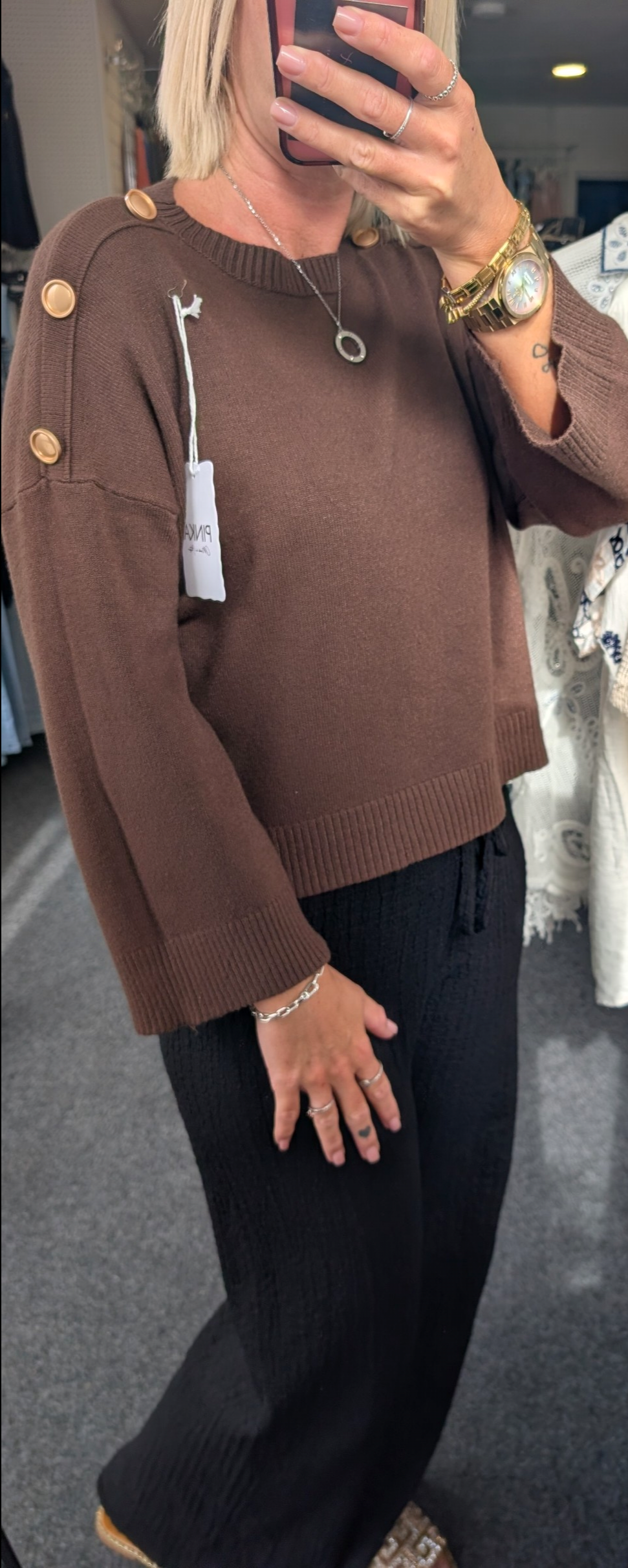 Long-Sleeved Knitted Sweater Features A Round Neckline And Distinctive Gold-Tone Decorative Buttons