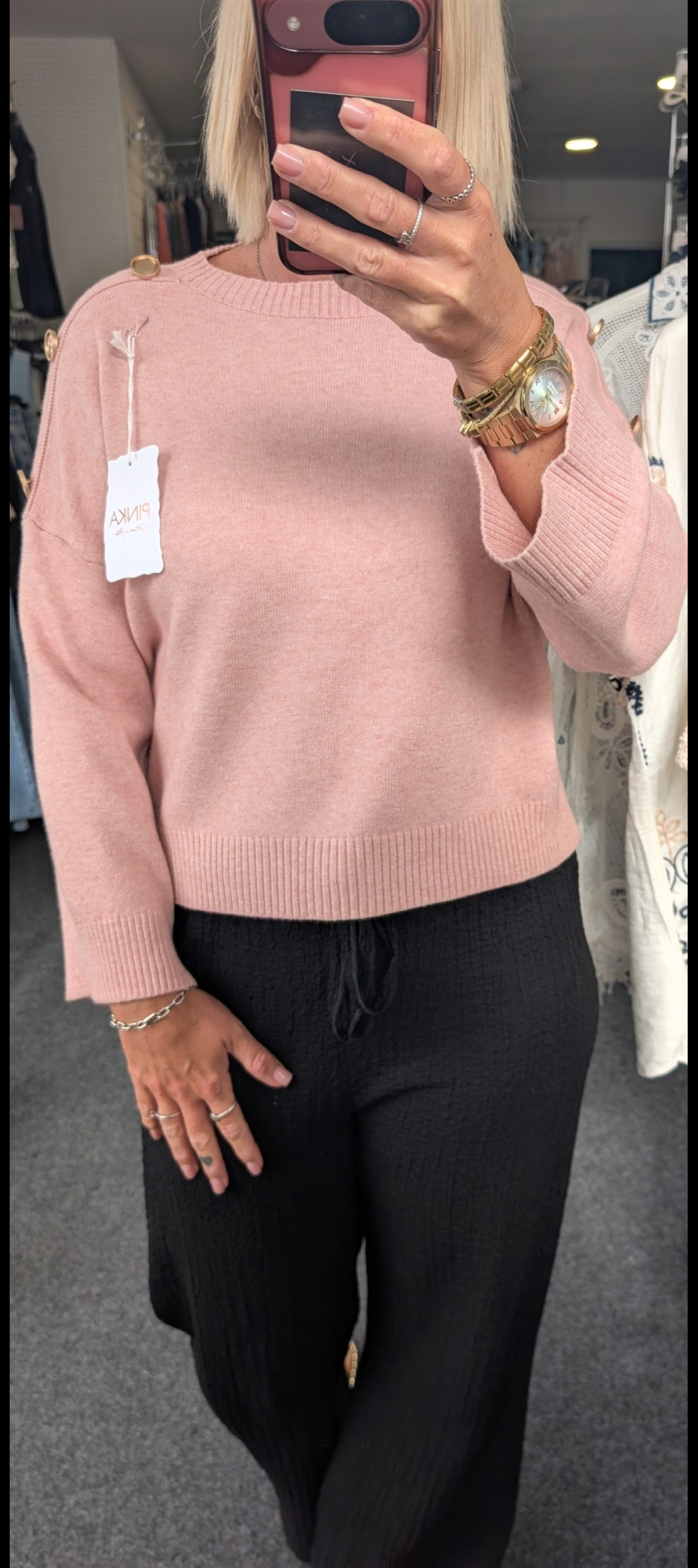 Long-Sleeved Knitted Sweater Features A Round Neckline And Distinctive Gold-Tone Decorative Buttons