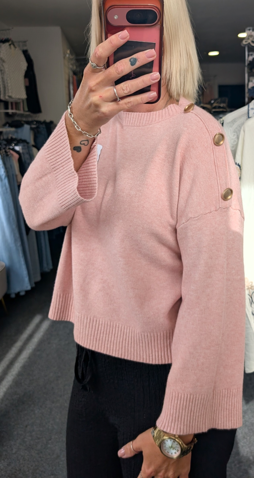 Long-Sleeved Knitted Sweater Features A Round Neckline And Distinctive Gold-Tone Decorative Buttons